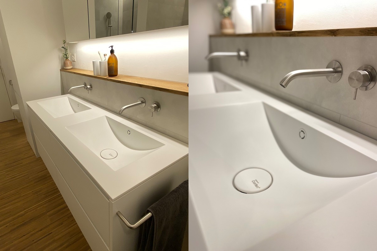 Close-up of the Refresh Double Washbasin in Corian® Glacier White and the wall-mounted tap.