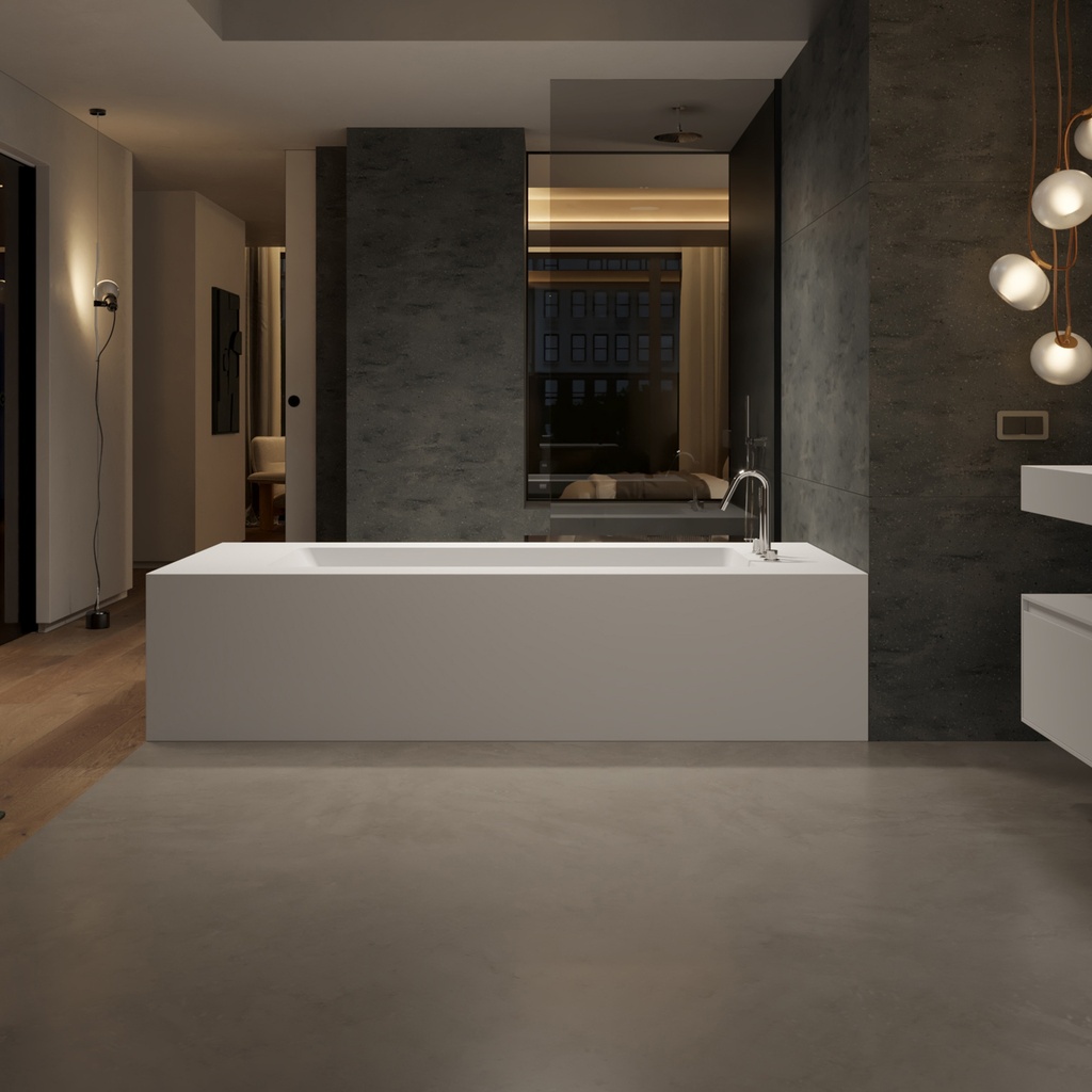 Aquila Bespoke Back-to-Wall Bath in Corian® with Built-in Shelving Front