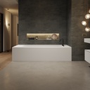 Aquila Bespoke Corner Bathtub in Corian® with Built-in Shelving Front